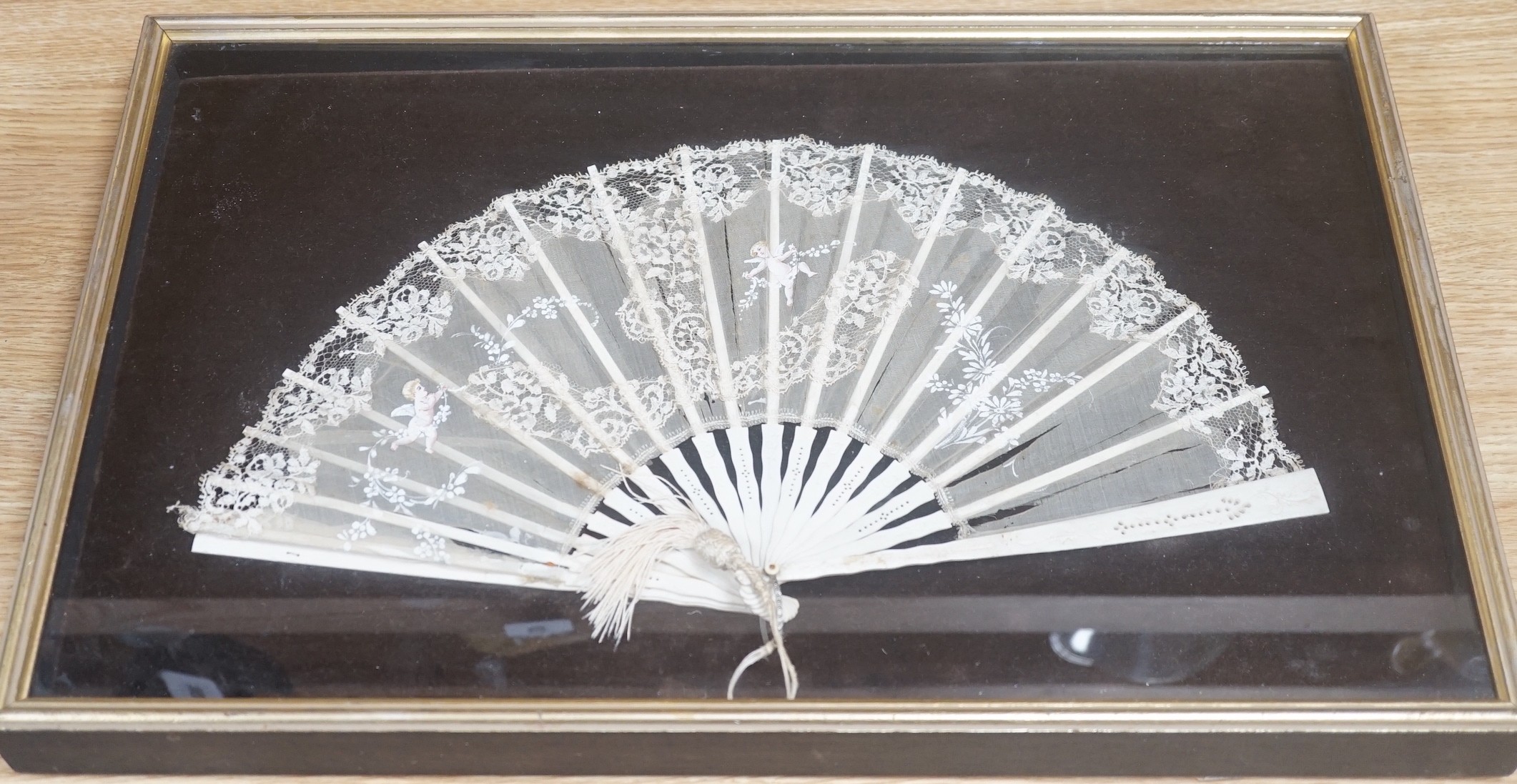 A pair of 19th century cased bone and painted lace fans, 40cm long excl frame